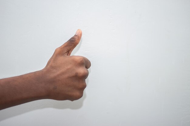 Close-up of hand against white background