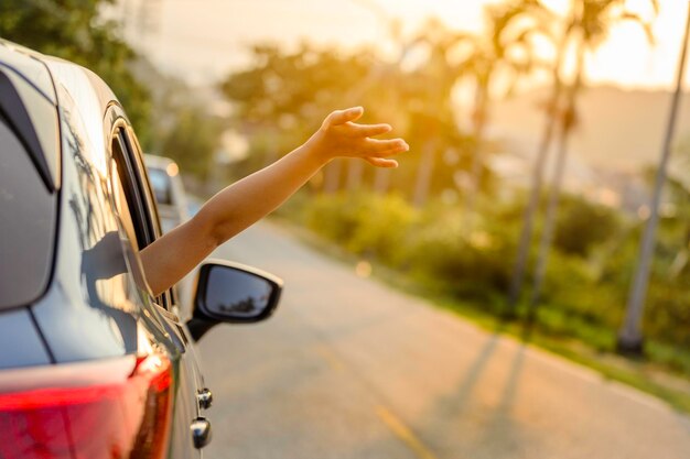 Photo close-up of hand on car windshield