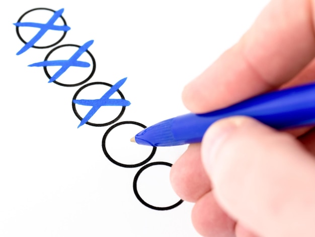 Close-up of hand checking points