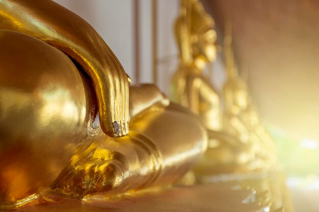 Close up hand of golden buddha