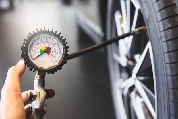 Close-up of hand holding bicycle