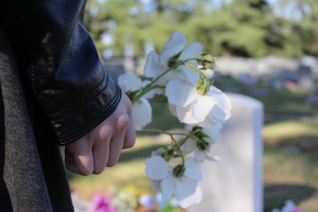 close-up of hand holding bouquet