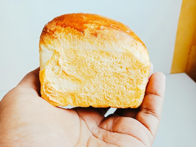 Close-up of hand holding bread