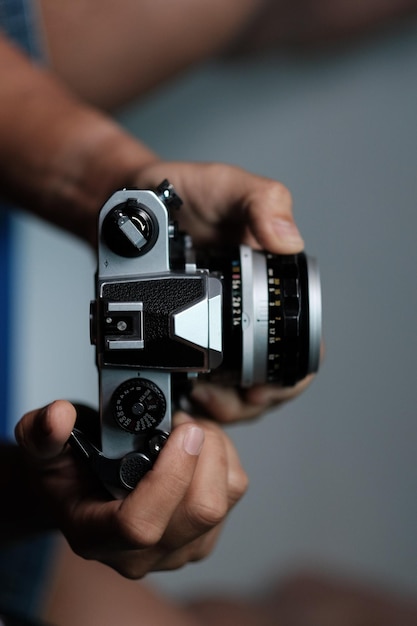 close-up of hand holding camera