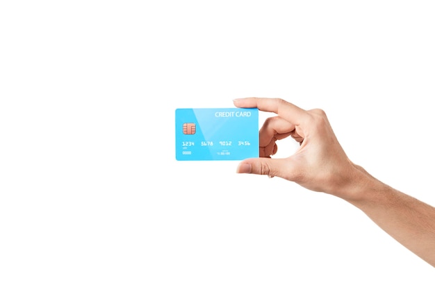 Close-up of hand holding credit card against white background