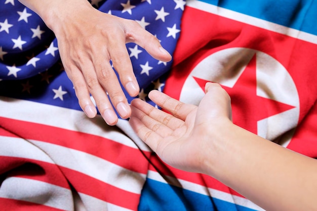 Photo close-up of hand holding flag
