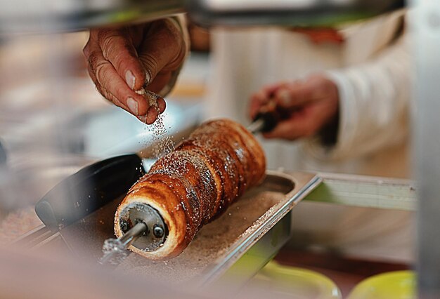 Photo close-up of hand holding food