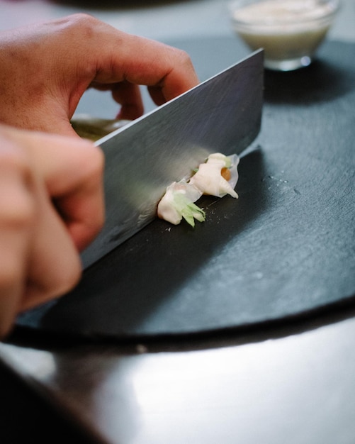 Photo close-up of hand holding food