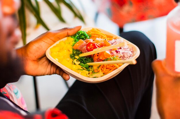 Photo close-up of hand holding food