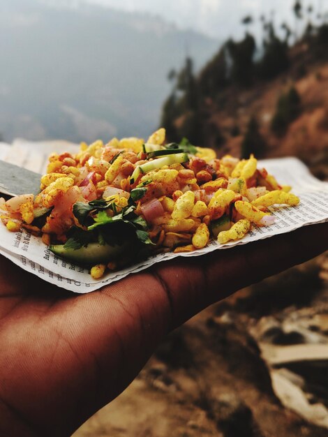 Close-up of hand holding food