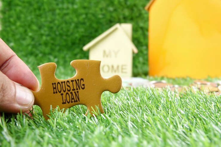 Close-up of hand holding grass