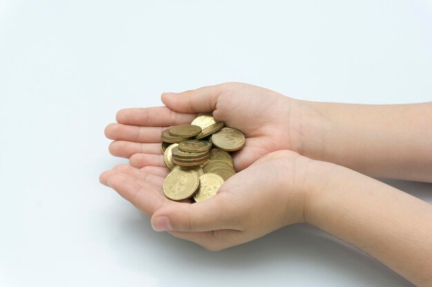 Close-up of hand holding hands over white background