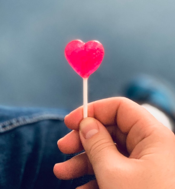 close-up of hand holding heart shape