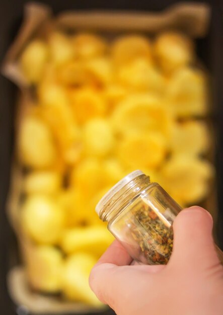 Close-up of hand holding jar