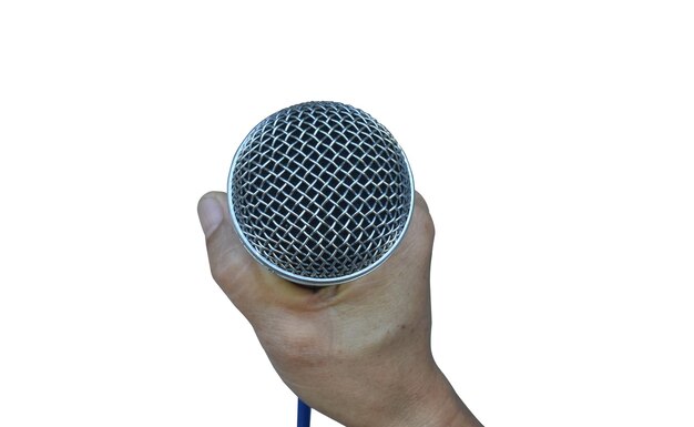 Close-up of hand holding microphone against white background