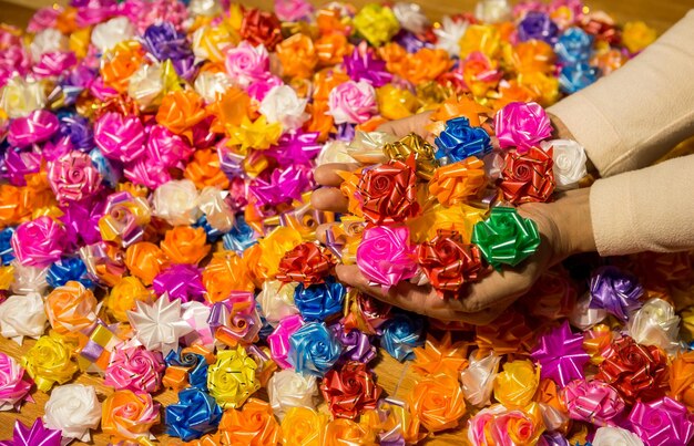 Close-up of hand holding multi colored candies