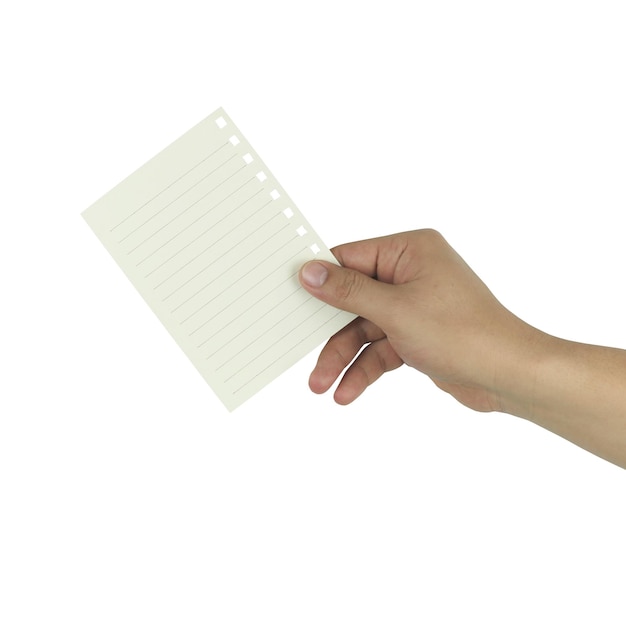 Close-up of hand holding paper against white background