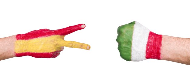 Photo close-up of hand holding red leaf against white background