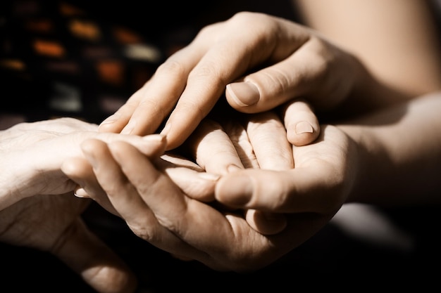 Close-up of hand holding text