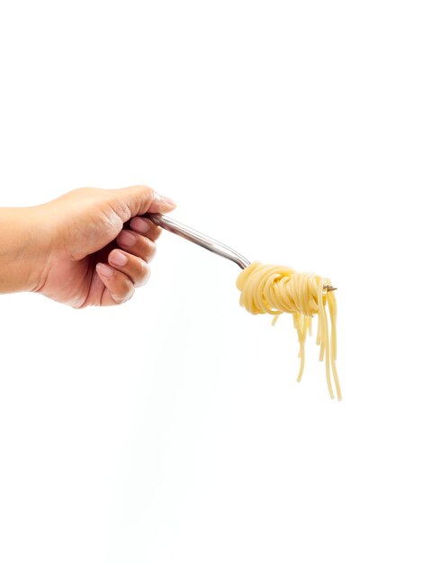 Photo close-up of hand holding umbrella against white background