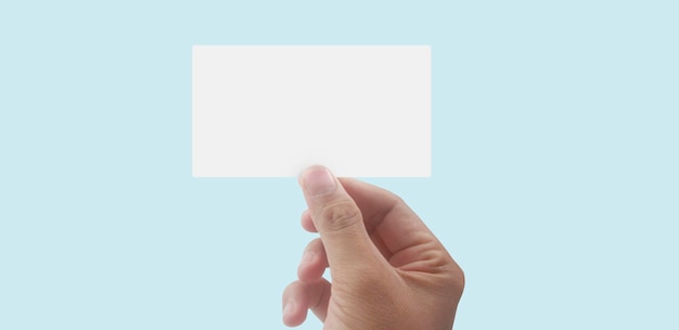 Close up of hand holding virtual card with Credit card