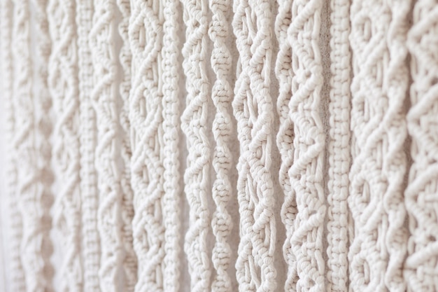 Close-up of hand made macrame texture pattern.
