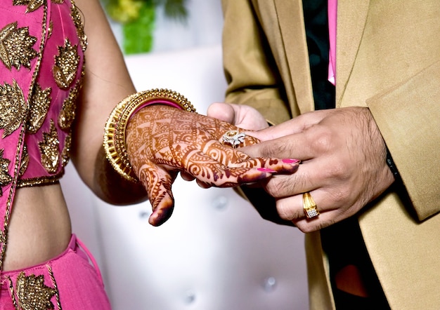 Premium Photo | Close-up of newlyweds hands and wedding bouquet