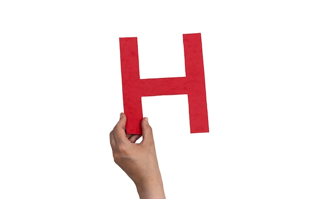 Foto close-up hand met papier letter h geïsoleerd op wit