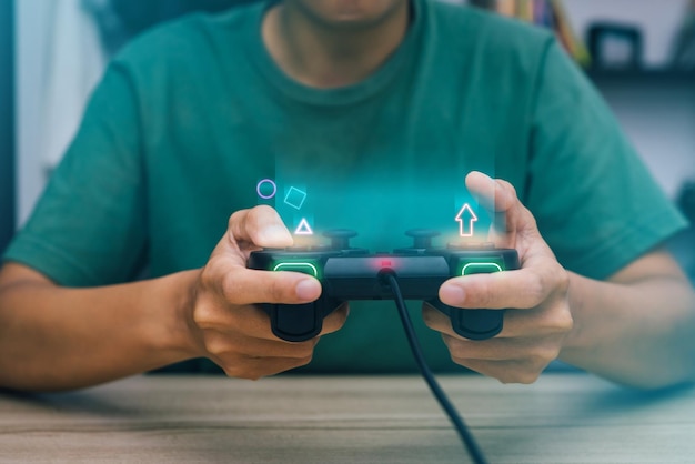 Close up hand playing game using joystick console a games gadget video games