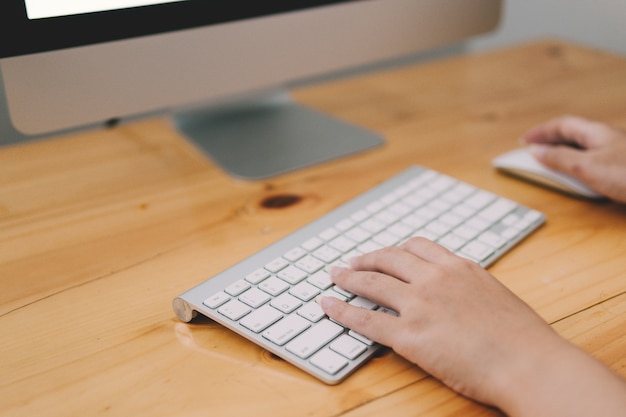 Close up hand's business woman typing keyboard