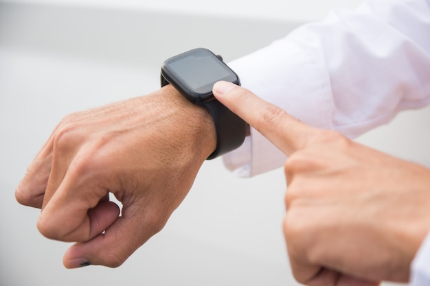 Close up hand  touch on smartwatch technology