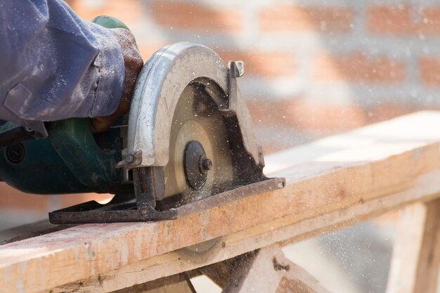 Close-up of hand working on water