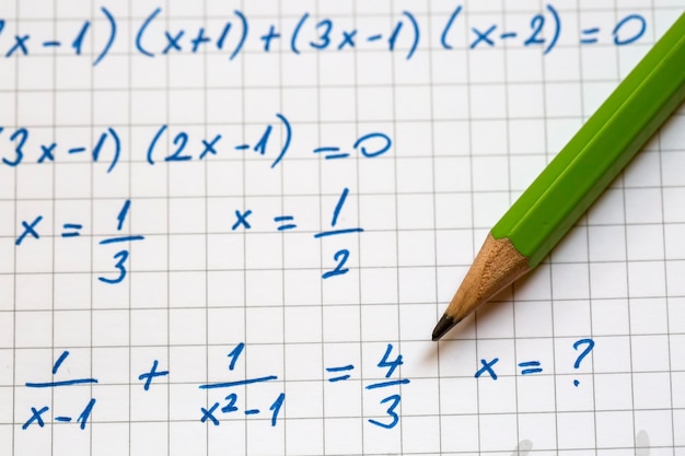 Photo close-up of hand written mathematical formulas. concept of education