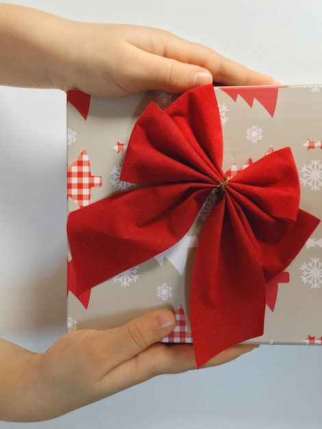 close-up of hands holding gift