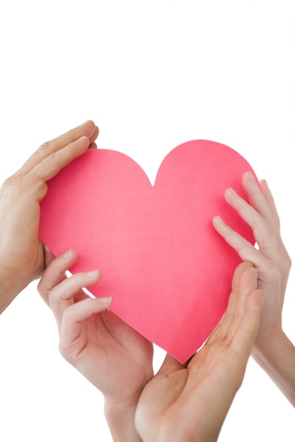 Close up of hands holding heart