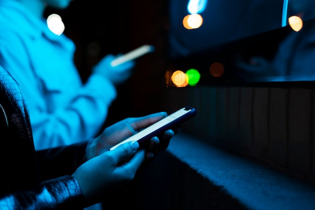 Photo close up hands holding smartphone