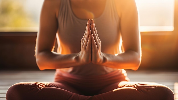 Close up of hands meditating in yoga class