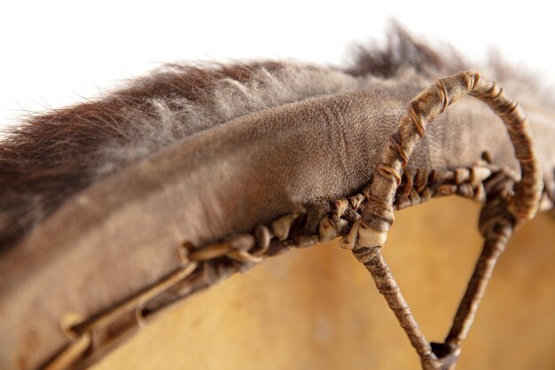 Photo a close up of hands playing the tambourine, percussion on white studio background