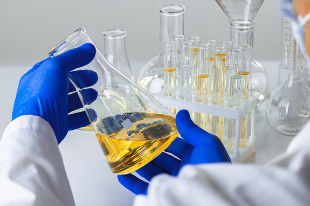 Close up of hands of a scientist working with laboratory samples