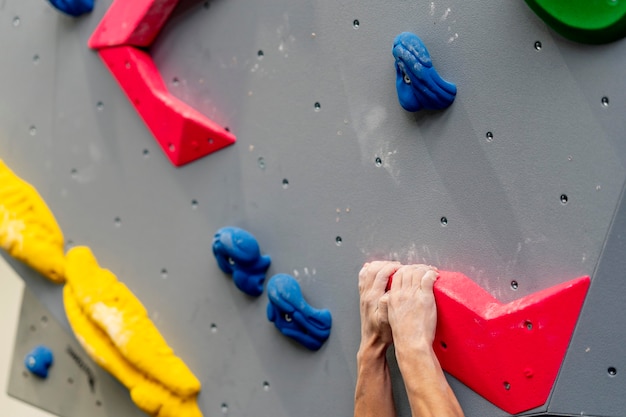 Close-up of the hands of a white magnesium climber.