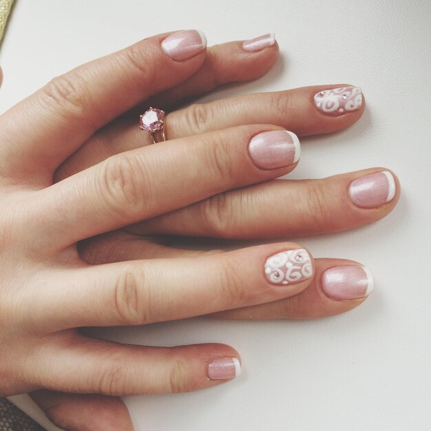 Photo close-up of hands with nail art