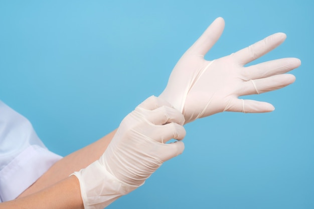 close up hands with sterile gloves