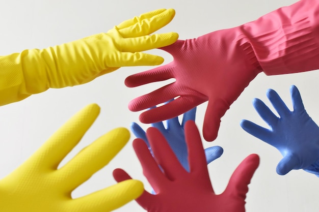 close-up of hands over yellow background