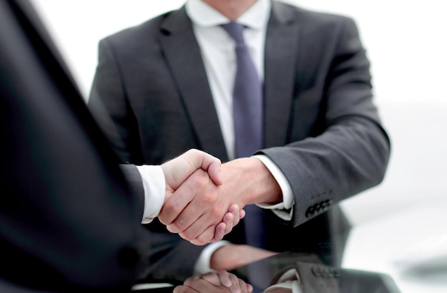 Close up handshake business people concept of partnership