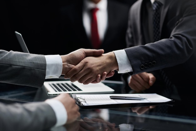 Close up handshake of business people in the office