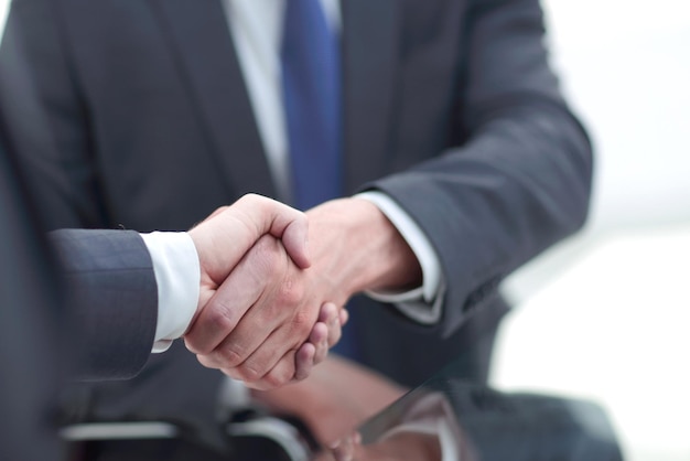 Close up handshake business people