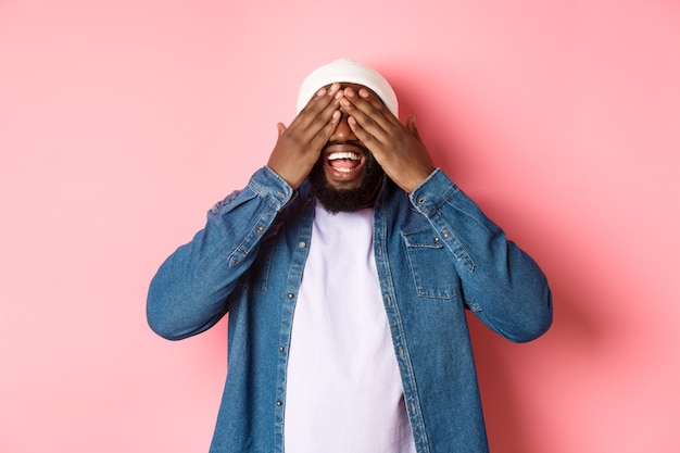 Close up on handsome young black man isolated