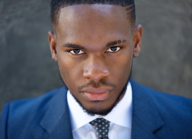 Close up handsome young business man in suit