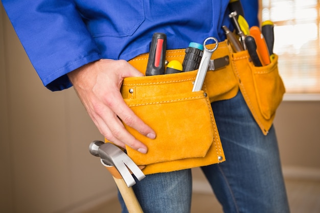 Close up of handyman in tool belt