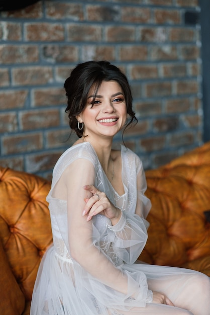 Close up on happy brunette bride indoors